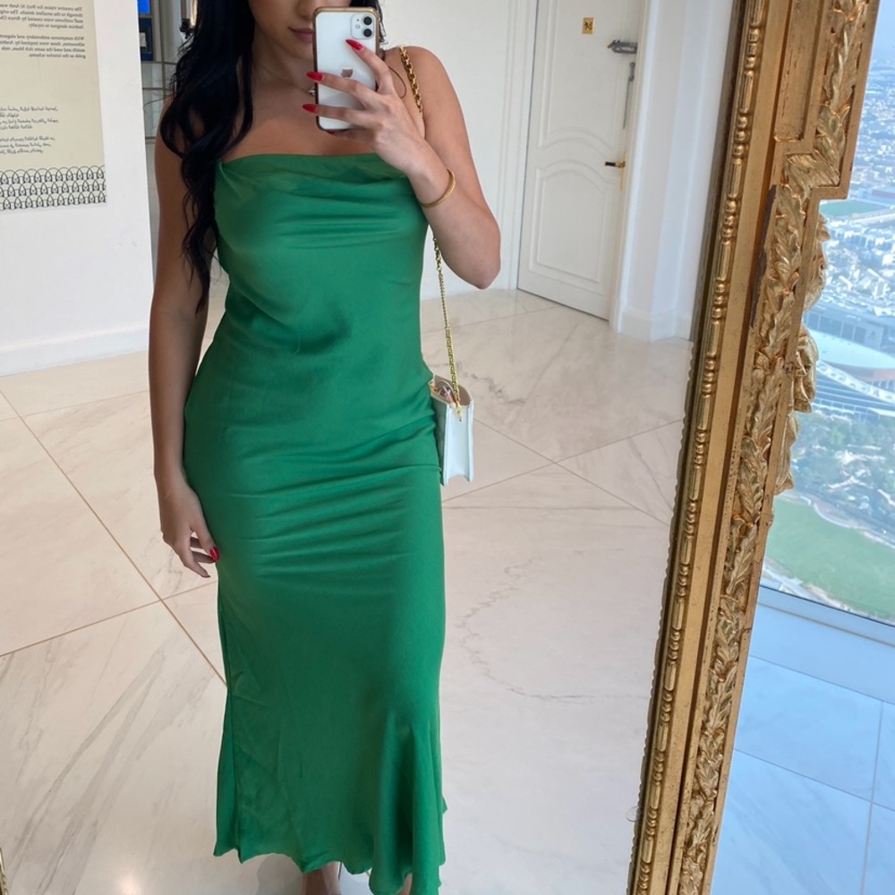 Camille green dress from miss Lola boutique worn once on my trip to Dubai